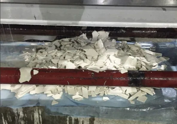 Coconut oil foots cake discharged from a filter press